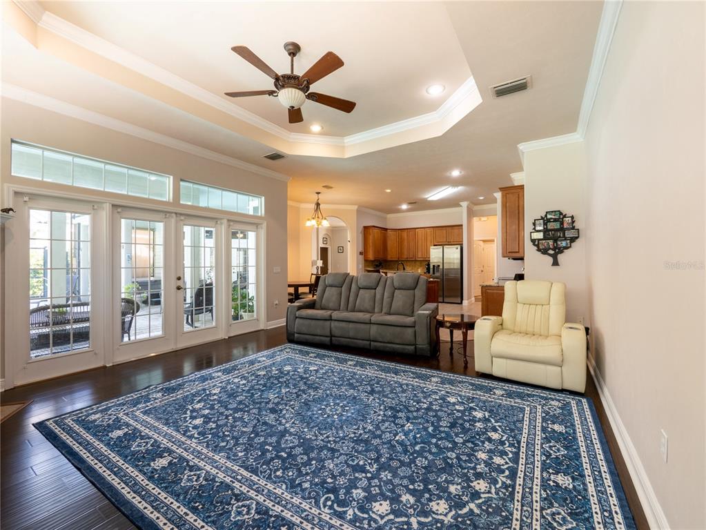 1488 Southwest 84th Terrace Gainesville, FL 32607 - Photo 6 of 31 a living room with furniture or couch and a rug