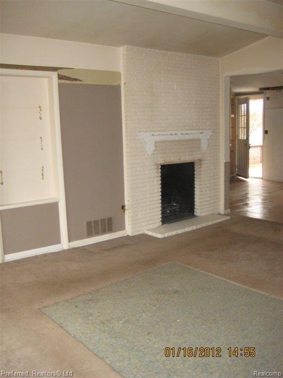 8491 Belleville Road Belleville, MI 48111 - Photo 6 of 9 living room fireplace.JPG