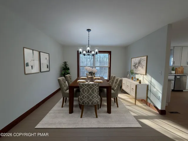 a view of a dining room with furniture