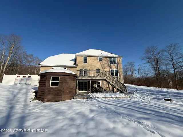 a view of a house with a park