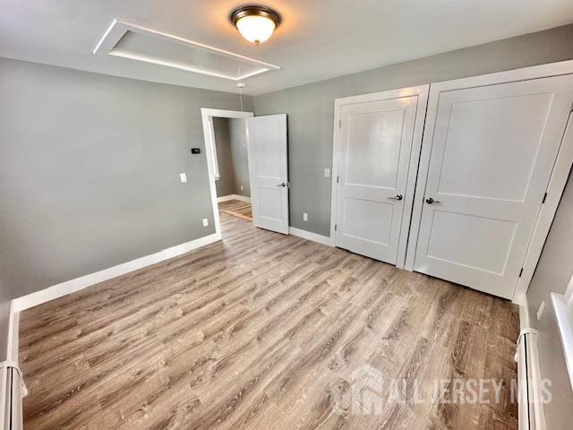 15 Doughty Street, Unit C Raritan, NJ 08869 - Photo 15 of 18 wooden floor in an empty room
