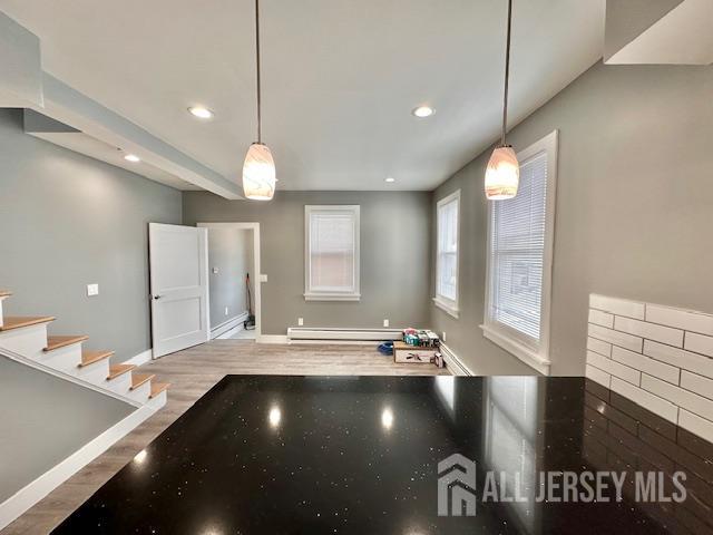 15 Doughty Street, Unit C Raritan, NJ 08869 - Photo 8 of 18 a view of a lobby with furniture and floor to ceiling window