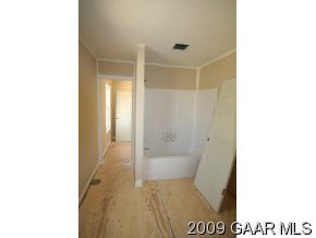 249 Augusta Farms Road Waynesboro, VA 22980 - Photo 6 of 12 a bathroom with a tub and shower