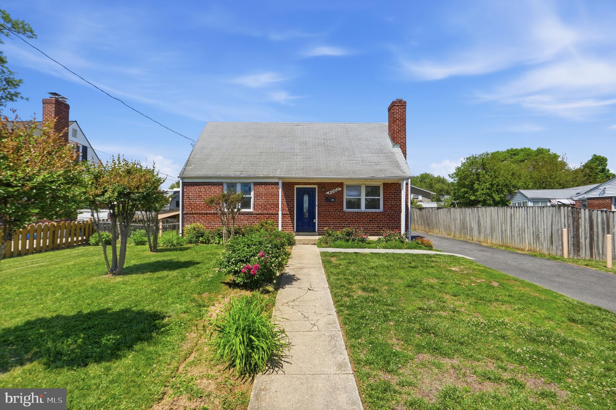 4003 Randolph Road Silver Spring, MD 20902 - Photo 1 of 30 Charming brick home with lush greenery.
