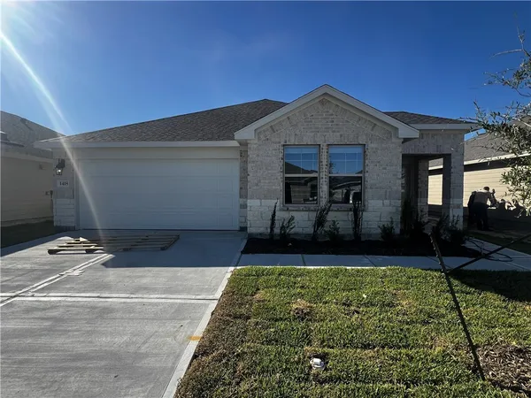 a front view of house with yard