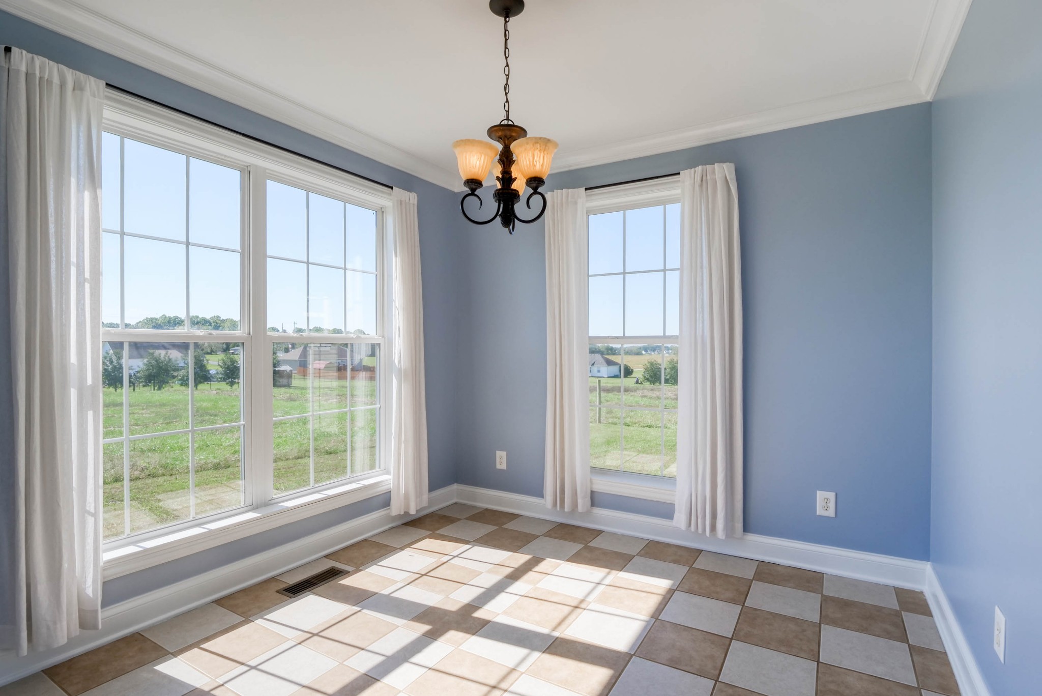 724 Lear Road Portland, TN 37148 - Photo 12 of 32 a view of an entryway with wooden floor and windows