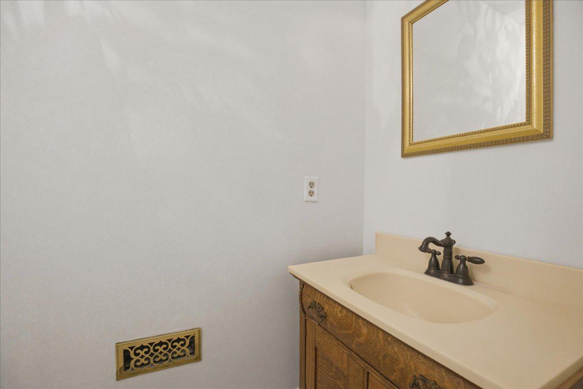 2070 Turner Road Lusby, MD 20657 - Photo 43 of 79 Half bath tucked under stair to basement