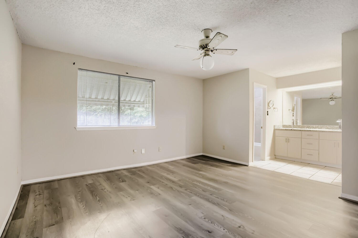 10103 Inwood Shadows Street Houston, TX 77088 - Photo 16 of 32 a view of an empty room with a window