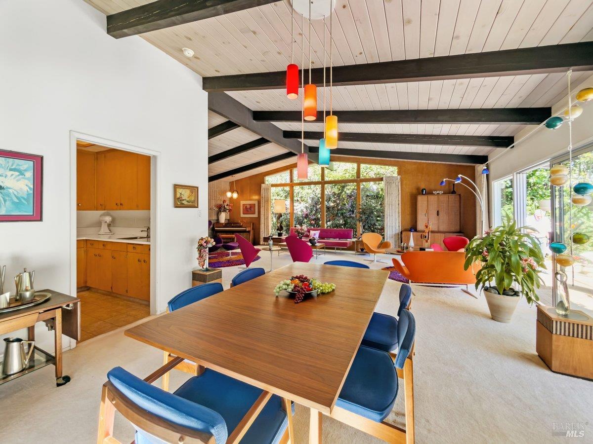 5 Mather Road San Anselmo, CA 94960 - Photo 14 of 58 a dining room with furniture water view and a fireplace