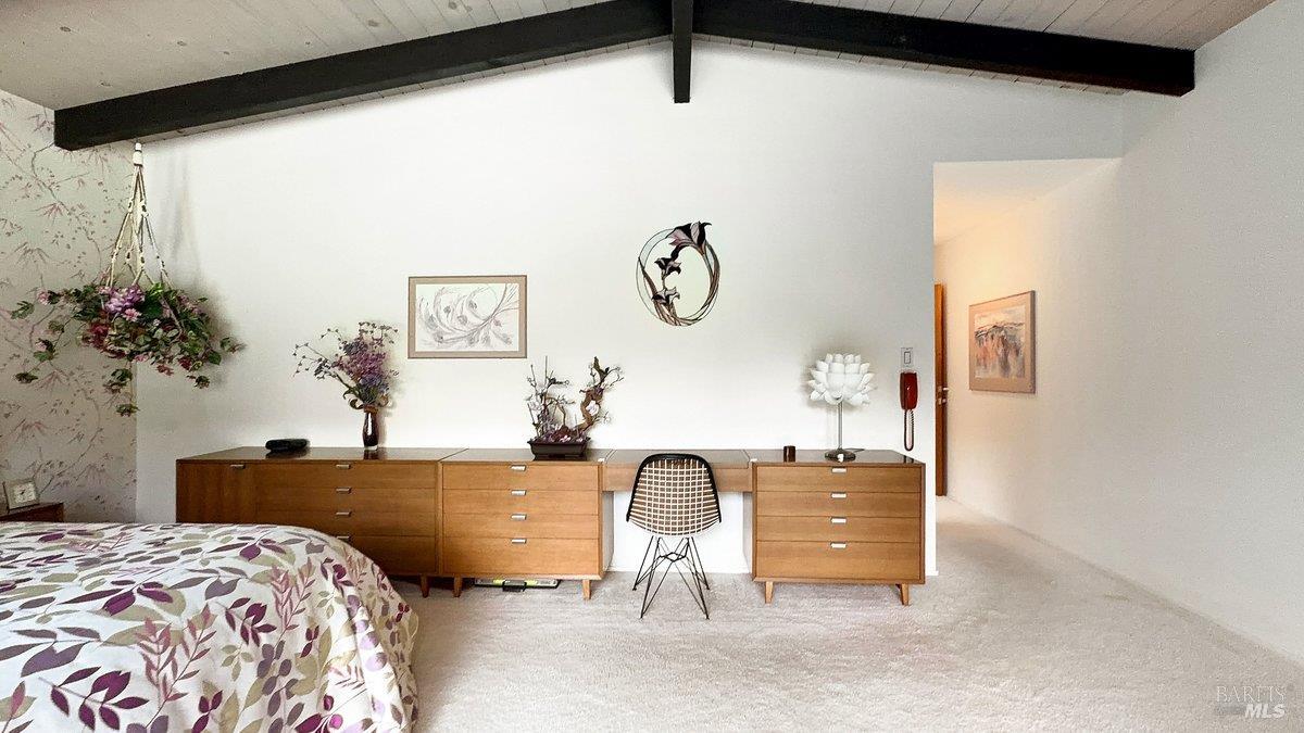 5 Mather Road San Anselmo, CA 94960 - Photo 17 of 58 a bedroom with a bed and a potted plant