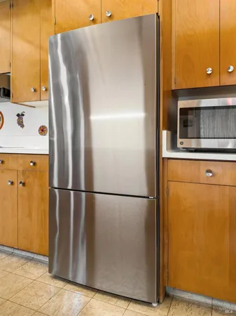 a kitchen with a stove and a microwave