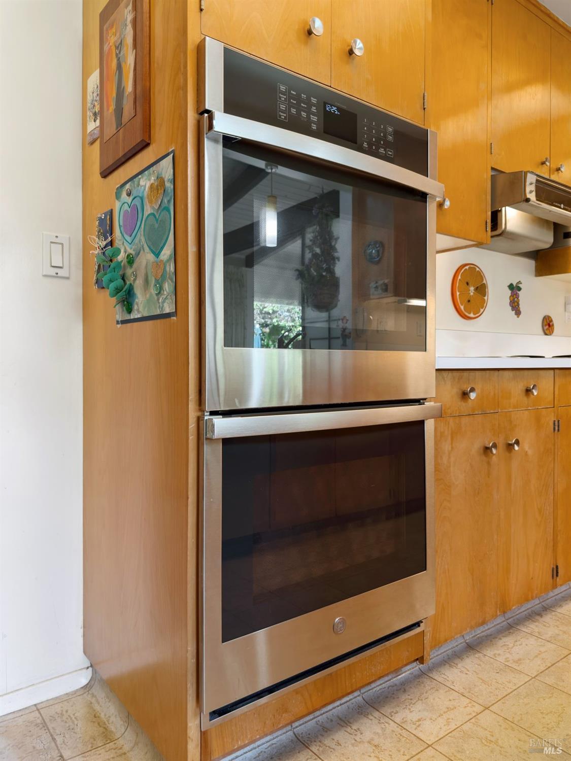 5 Mather Road San Anselmo, CA 94960 - Photo 24 of 58 a kitchen with a stove and a microwave