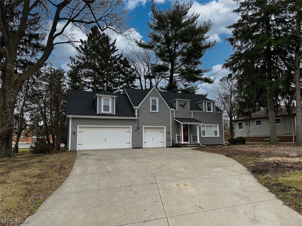 10260 West Pleasant Valley Road Parma, OH 44130 - Photo 2 of 34 View of front of property featuring a 3-car garage
