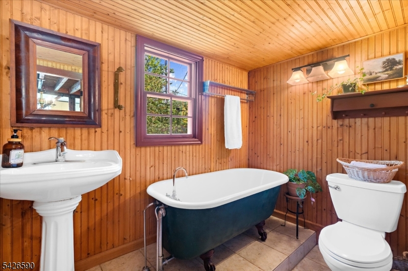 179 Lindbergh Road Hopewell, NJ 08525 - Photo 18 of 46 a bathroom with a sink a toilet and shower