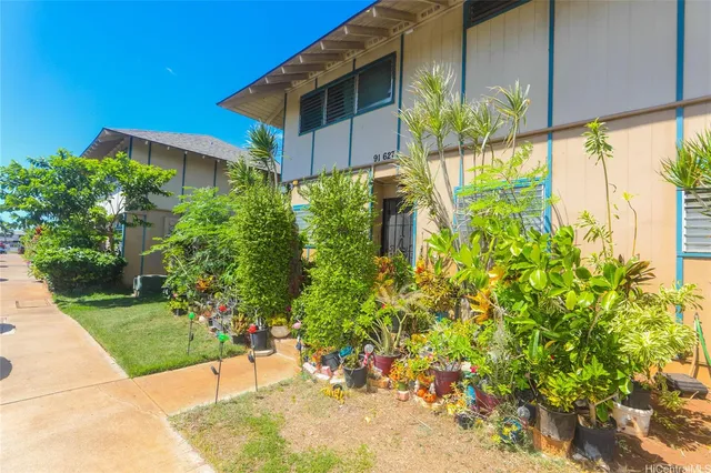 a view of a potted plants next to a building
