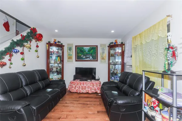 a living room with furniture and a couch