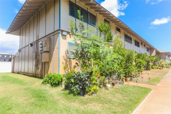 a view of a back yard of the house