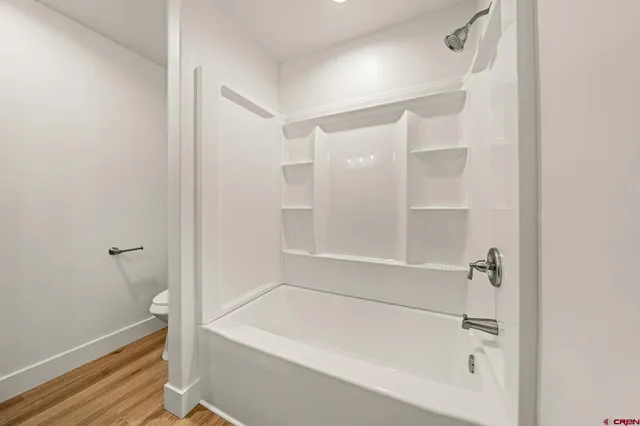 a close view of a bathtub in bathroom