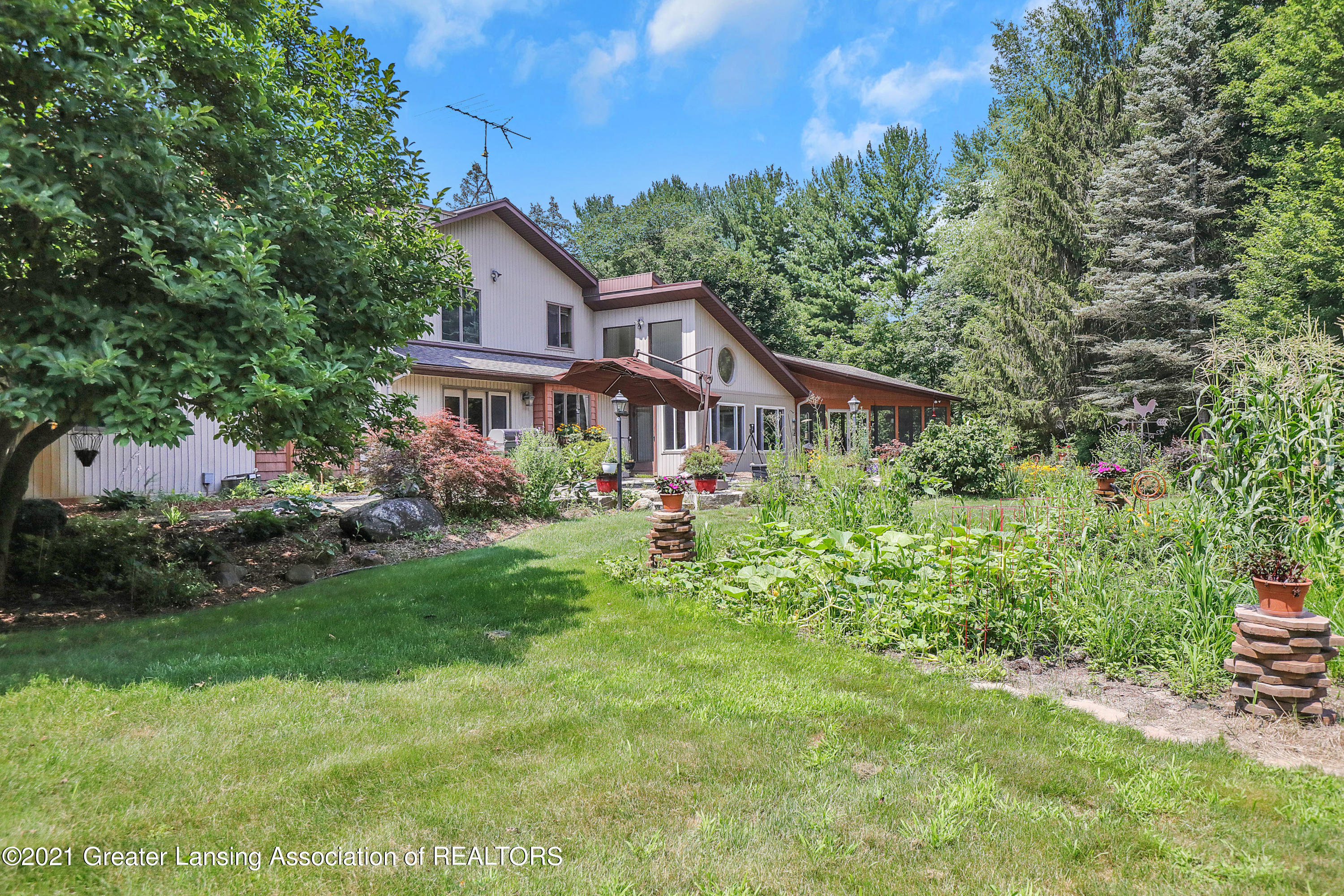 2274 College Road Holt, MI 48842 - Photo 36 of 38 View of home from backyard
