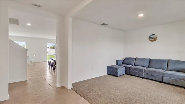 a living room with furniture and a couch
