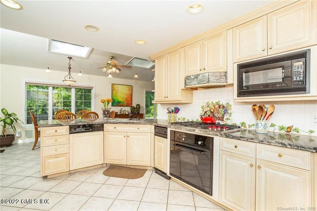30 Split Timber Place Riverside, CT 06878 - Photo 22 of 45 a kitchen with a sink cabinets and window