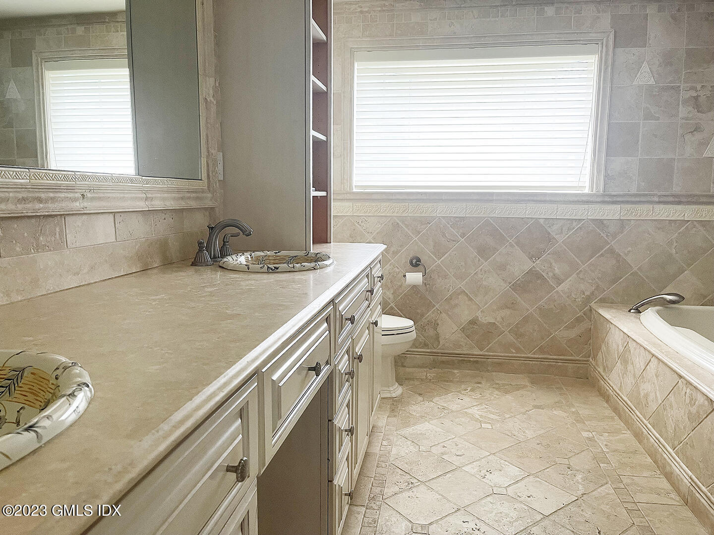 30 Split Timber Place Riverside, CT 06878 - Photo 28 of 45 a bathroom with a granite countertop sink a toilet and bathtub