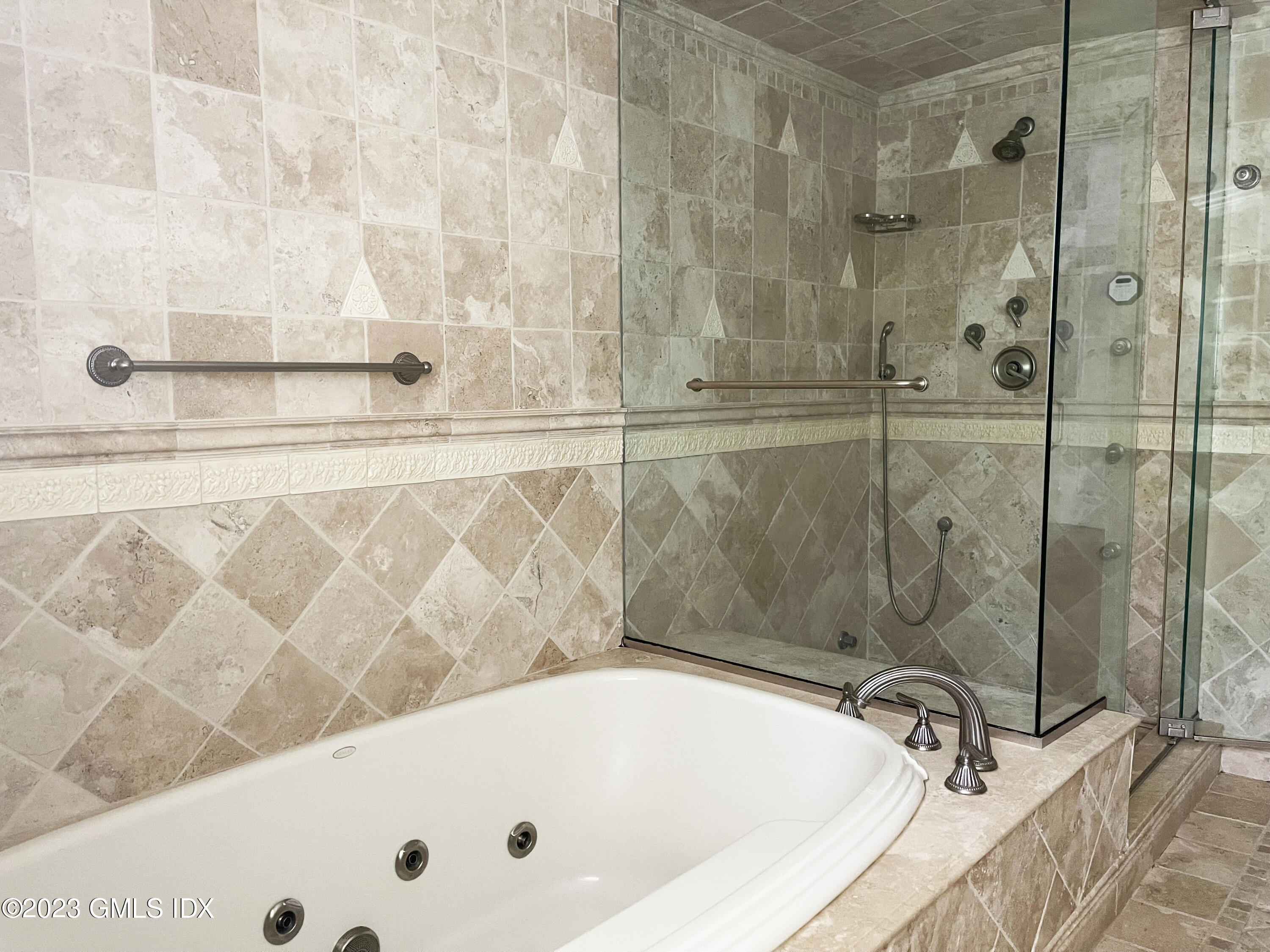 30 Split Timber Place Riverside, CT 06878 - Photo 30 of 45 a bathroom with a tub and a shower