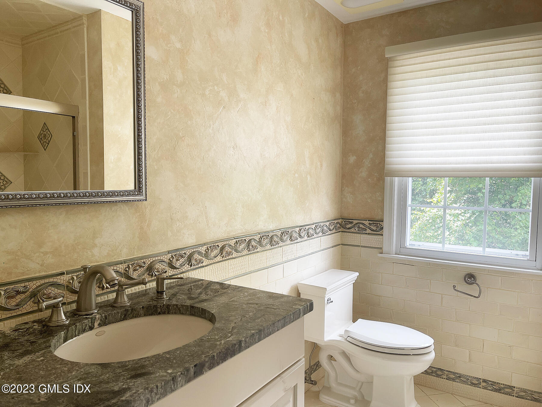 30 Split Timber Place Riverside, CT 06878 - Photo 35 of 45 a bathroom with a sink and a mirror