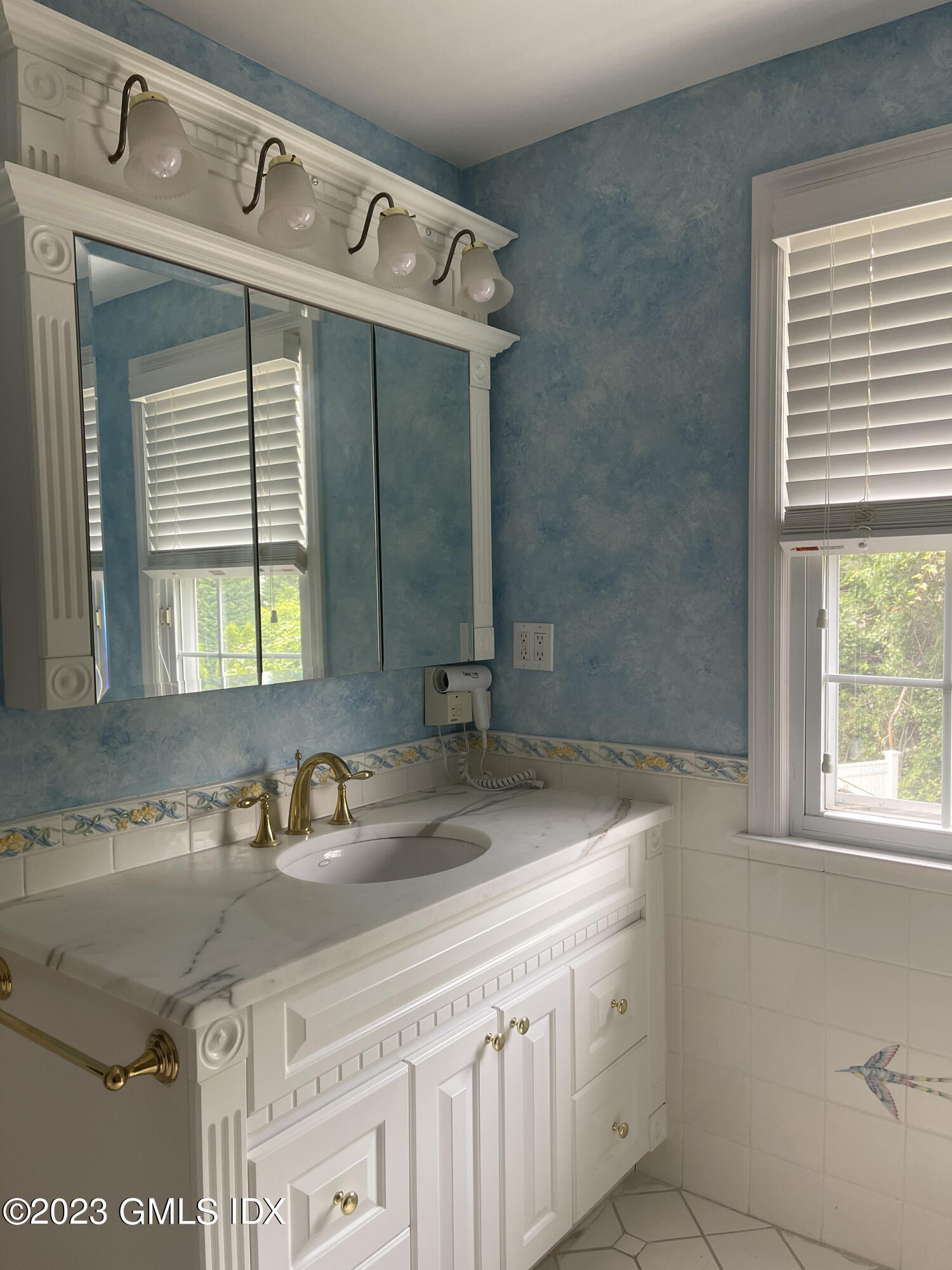 30 Split Timber Place Riverside, CT 06878 - Photo 38 of 45 a bathroom with a sink and a mirror