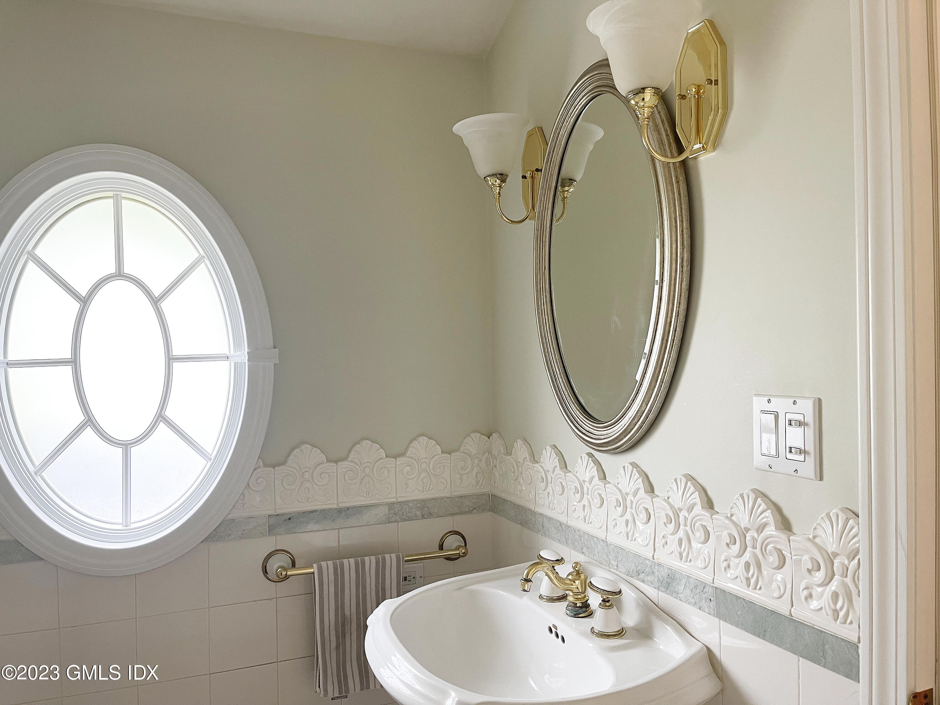 30 Split Timber Place Riverside, CT 06878 - Photo 39 of 45 a bathroom with a sink a mirror and a toilet