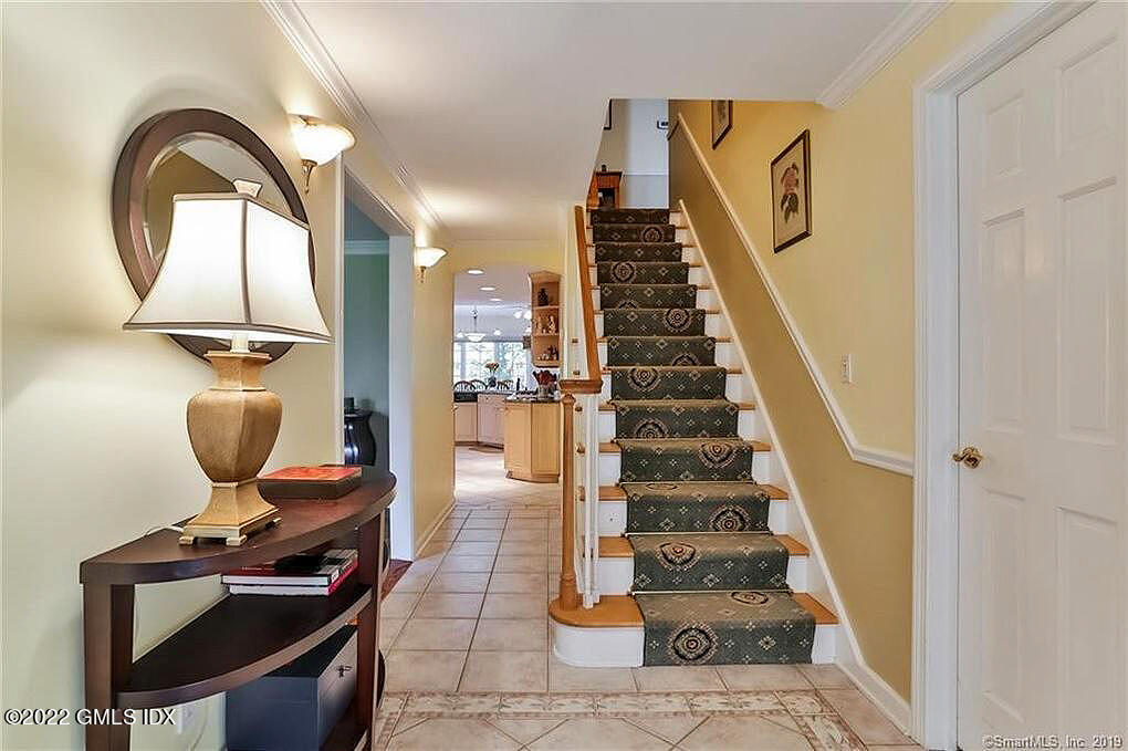 30 Split Timber Place Riverside, CT 06878 - Photo 6 of 45 a view of entryway and hall with wooden floor