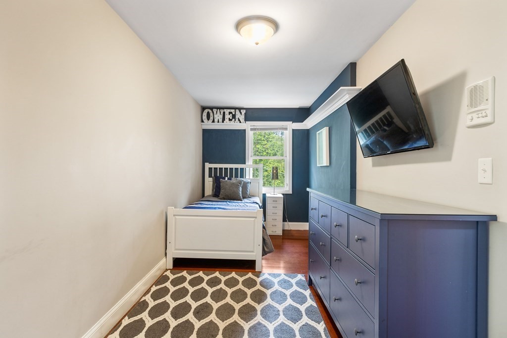 47 Victor Street Acushnet, MA 02743 - Photo 17 of 31 a living room with furniture and a flat screen tv