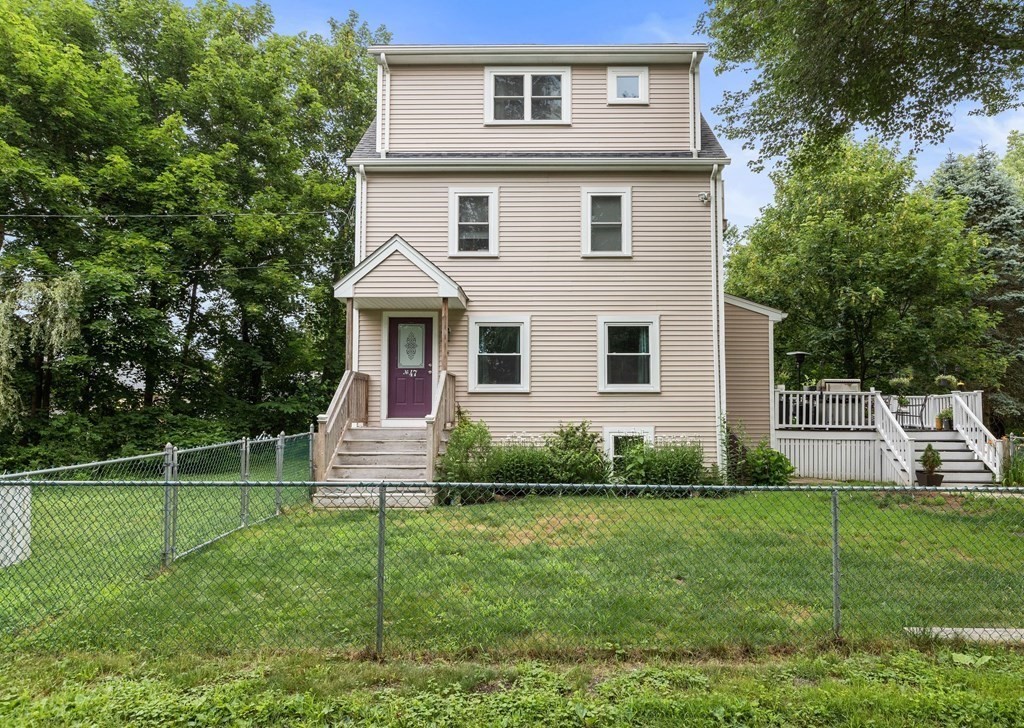 47 Victor Street Acushnet, MA 02743 - Photo 2 of 31 a front view of a house with a yard