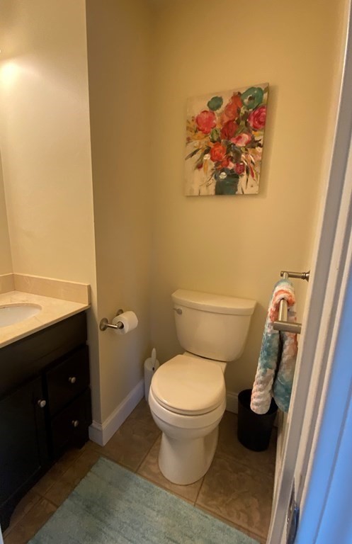 47 Victor Street Acushnet, MA 02743 - Photo 24 of 31 a bathroom with a toilet and a shower curtain