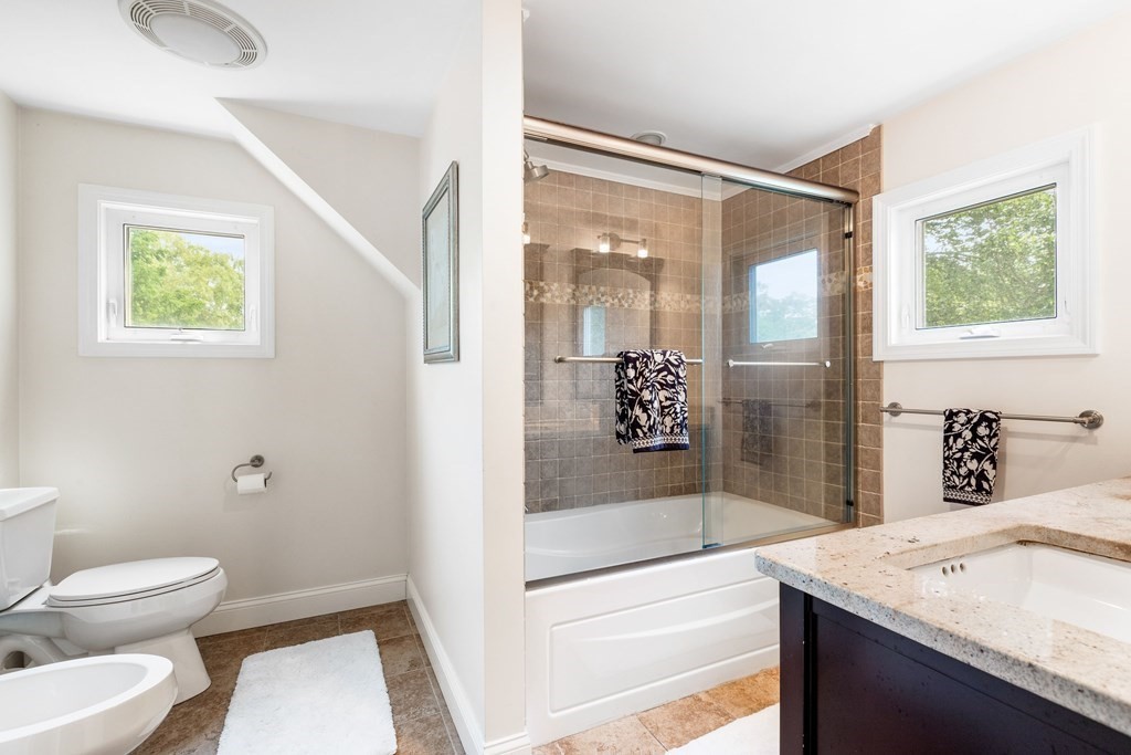 47 Victor Street Acushnet, MA 02743 - Photo 26 of 31 a bathroom with a granite countertop sink toilet and shower