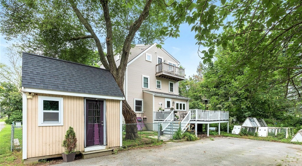 47 Victor Street Acushnet, MA 02743 - Photo 3 of 31 a front view of a house with a yard