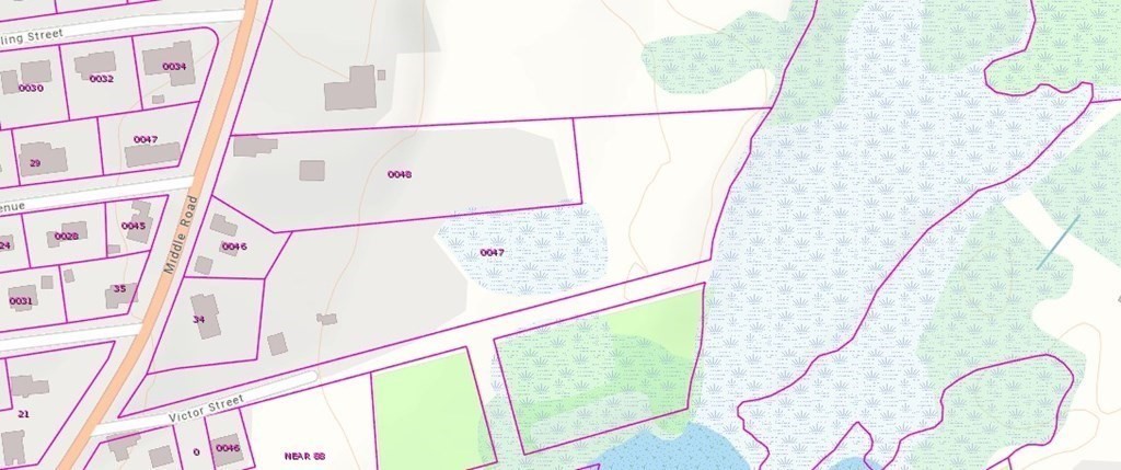 47 Victor Street Acushnet, MA 02743 - Photo 31 of 31 a view of a balcony with floor to ceiling windows and plants