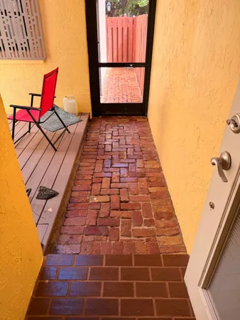 a view of a terrace with wooden floor