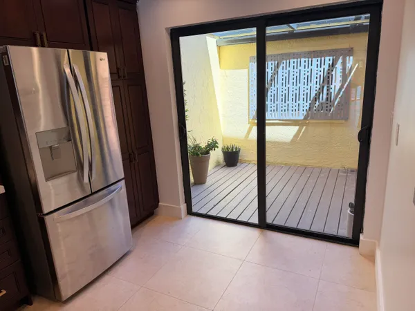 a view of front door and bedroom