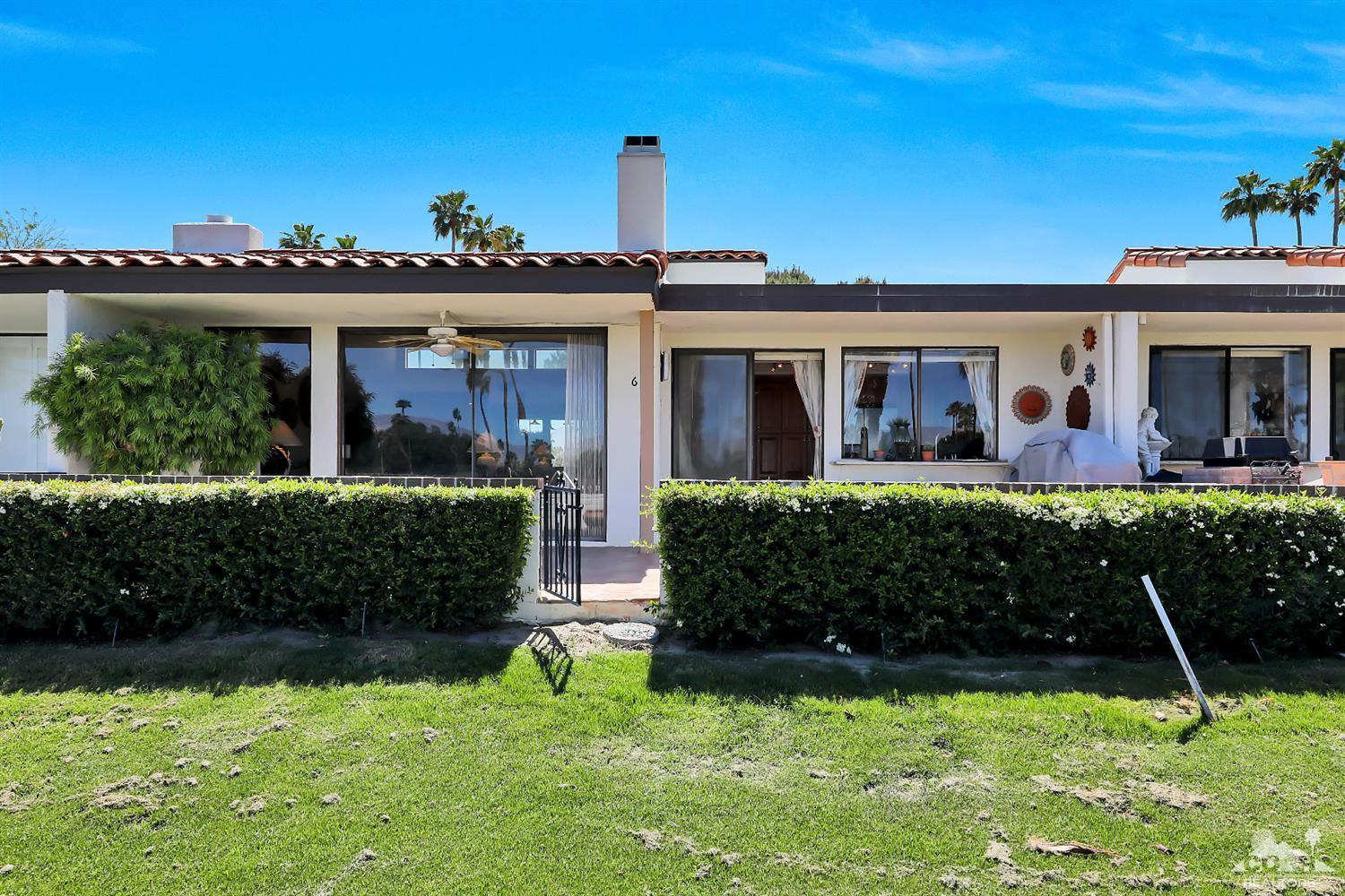 6 Palomas Drive Rancho Mirage, CA 92270 - Photo 16 of 20 front view of a house with a yard