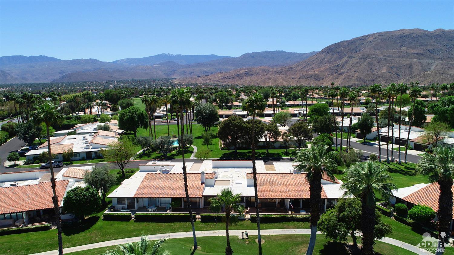 6 Palomas Drive Rancho Mirage, CA 92270 - Photo 17 of 20 a view of a town with mountains in the background