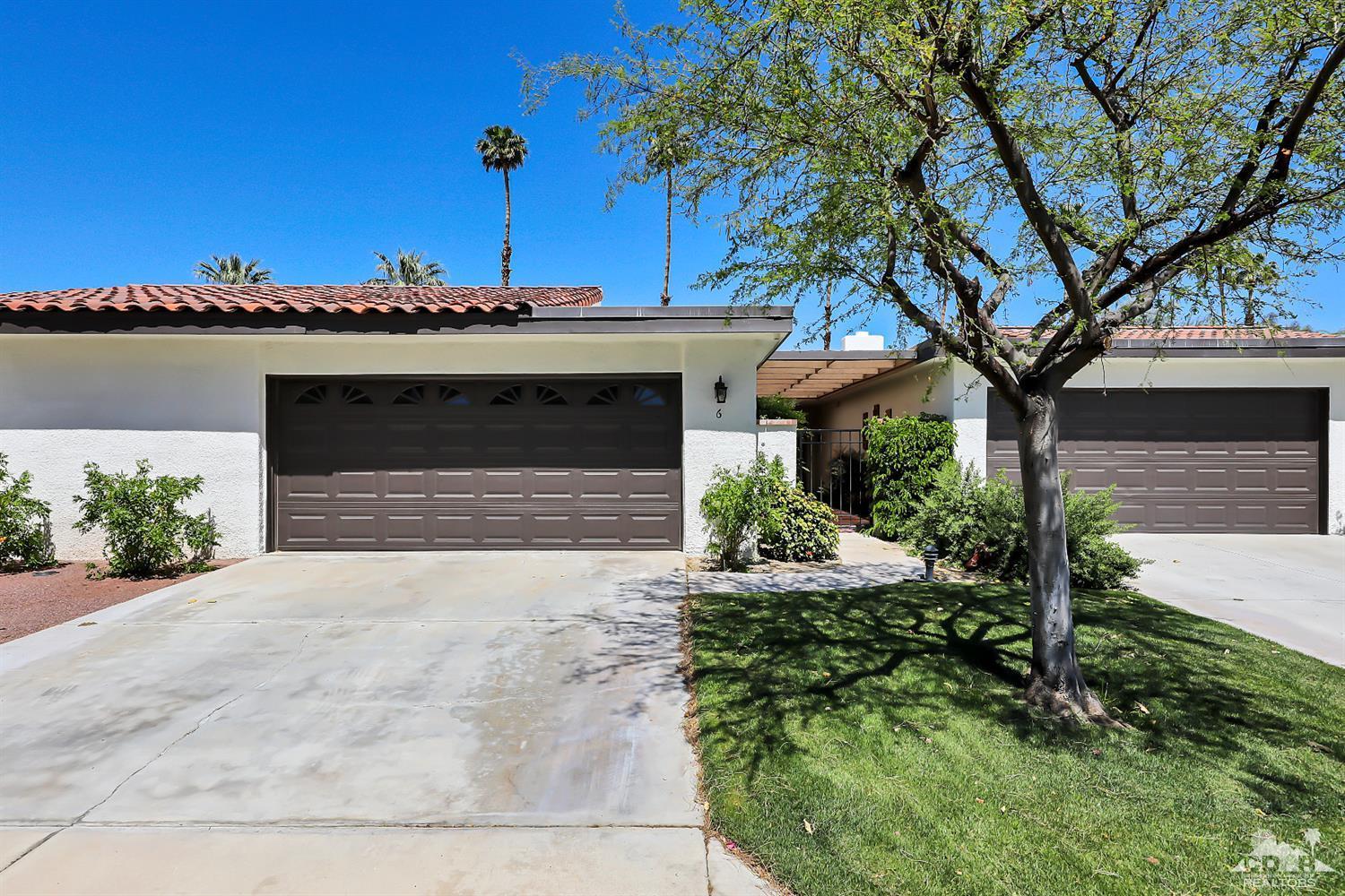 6 Palomas Drive Rancho Mirage, CA 92270 - Photo 20 of 20 a front view of a house with a yard and garage