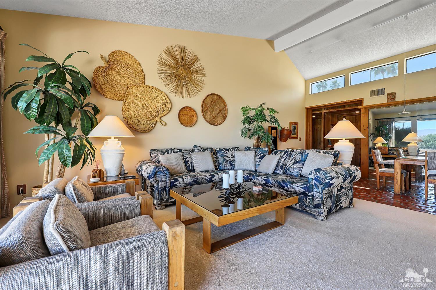 6 Palomas Drive Rancho Mirage, CA 92270 - Photo 4 of 20 a living room with furniture and a lamp