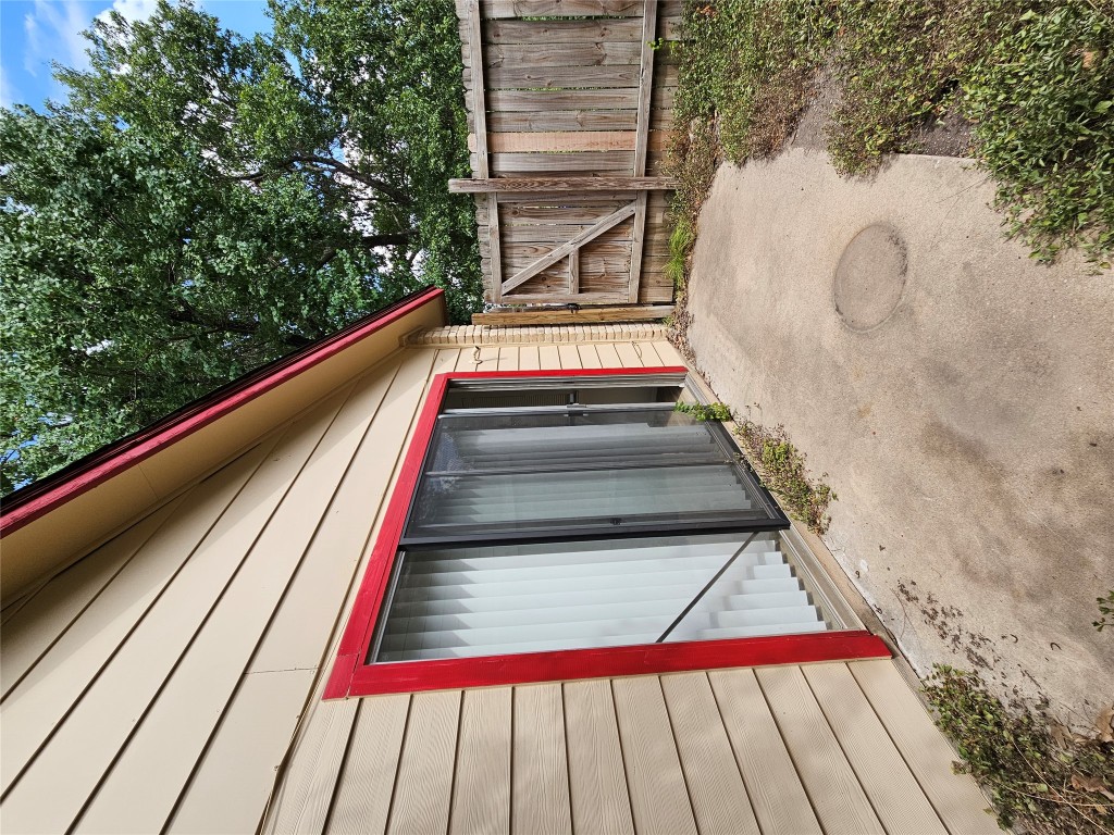 6000 Emerald Forest Drive, Unit A Austin, TX 78745 - Photo 18 of 19 a backyard of a house