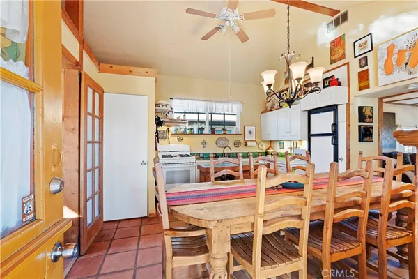 a kitchen with a stove and cabinets