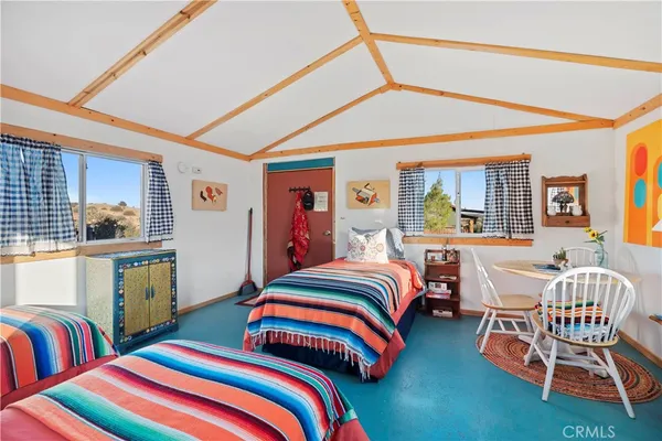 a bed room with a bed and a couch