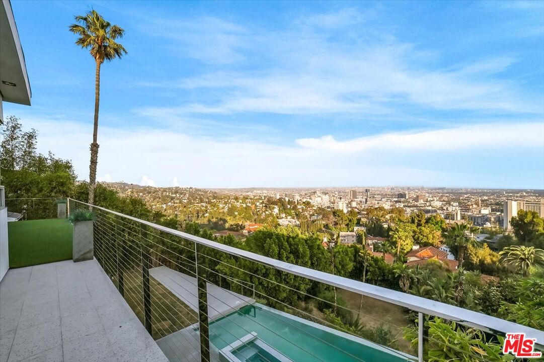 7044 Los Tilos Road Los Angeles, CA 90068 - Photo 15 of 58 a view of a city from a balcony