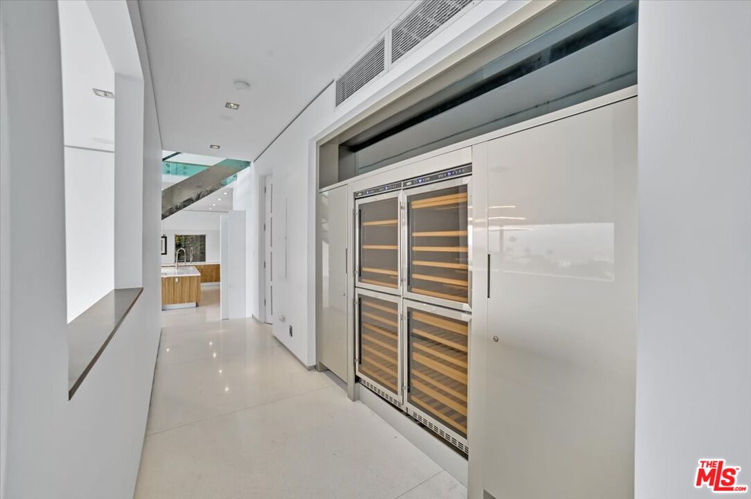 7044 Los Tilos Road Los Angeles, CA 90068 - Photo 38 of 58 a view of house with hallway
