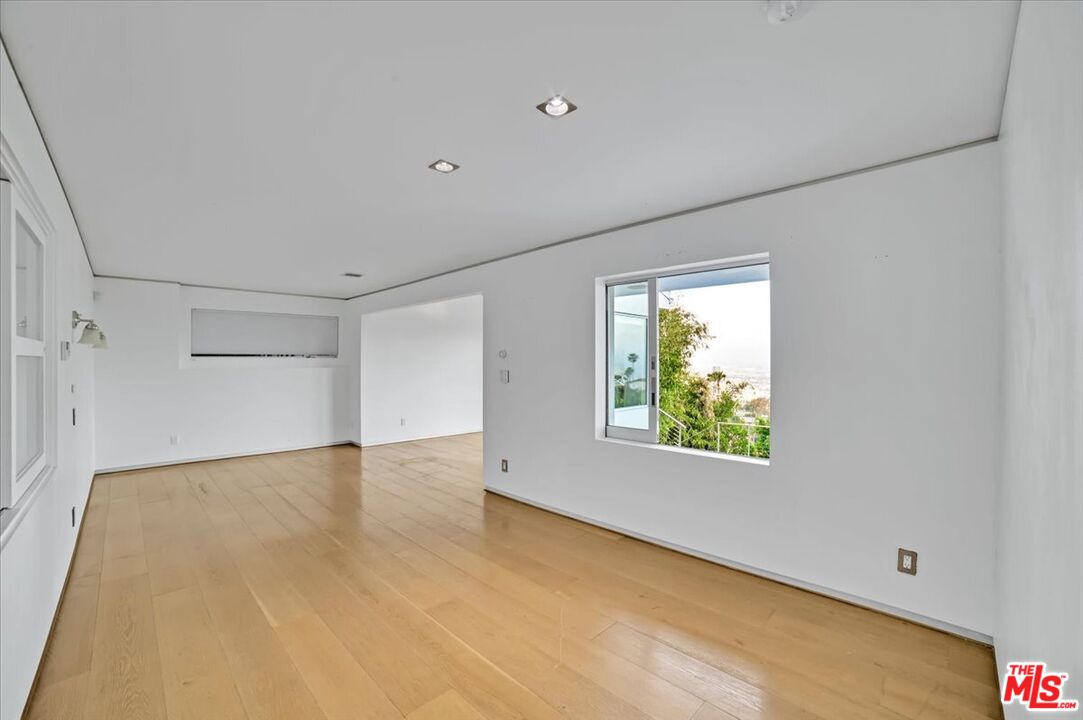 7044 Los Tilos Road Los Angeles, CA 90068 - Photo 39 of 58 a view of an empty room with a window