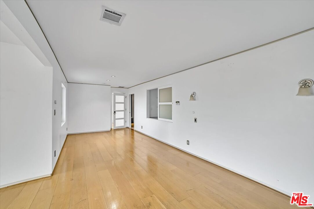 7044 Los Tilos Road Los Angeles, CA 90068 - Photo 40 of 58 a view of an empty room with a window